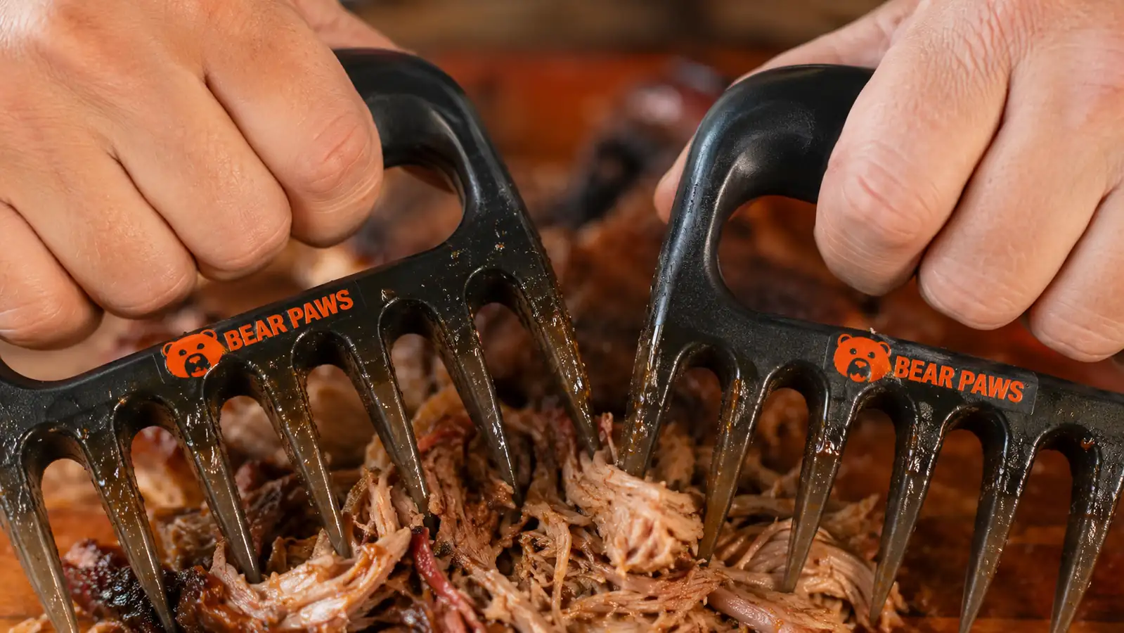 Close-up of the plastic tines on a Bear Paw claw showing wear and staining after repeated use